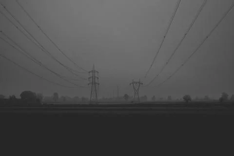 High voltage cables running over the plain Stock Photos
