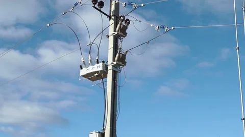 High voltage electric current. Mast high voltage wires against background of the Stock Footage 143456533