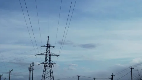 High-Voltage Electric Pole and Time Lapse of Clouds and Blue Sky  in Good Clear  Stock Footage 150585485