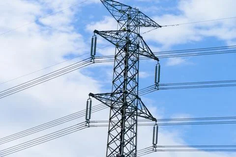 High voltage electric pole with power line electricity engineer distributio.. Stockfoto's