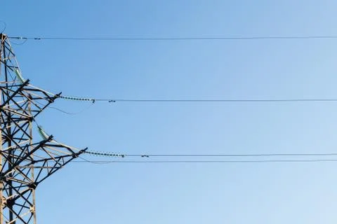 High-voltage electric support at the edge of the frame. Power electric wires  Stock Photos