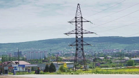 High-voltage electric supports field near the road outside Feodosiya Stock Footage 108345375