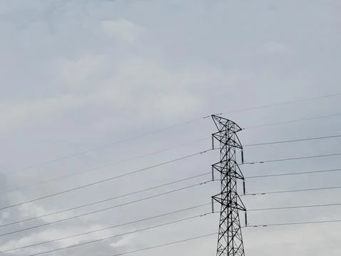 High voltage electric tower line pylon for distribution of electricity. Stock Photos