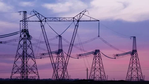 High Voltage Electric Transmission Tower Energy Pylon. Sunset. Heat haze Stock Footage 74333845