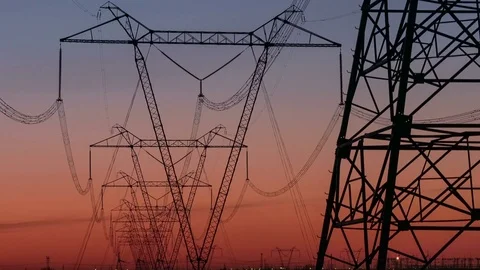 High Voltage Electric Transmission Tower Energy Pylon. Sunset. Heat haze Stock Footage 74337674