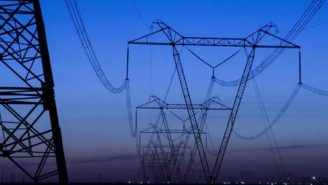 High Voltage Electric Transmission Tower Energy Pylon. Sunset. Heat haze Stock-Footage 74341708