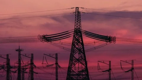 High Voltage Electric Transmission Tower Energy Pylon. Sunset. Heat haze Vidéo 75636423