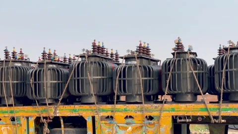 High Voltage Electrical Power Distribution Transformers on Transport Truck Stock Footage 341083353