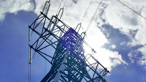 High voltage electrical power lines transmitting energy Stock-Footage 337645934