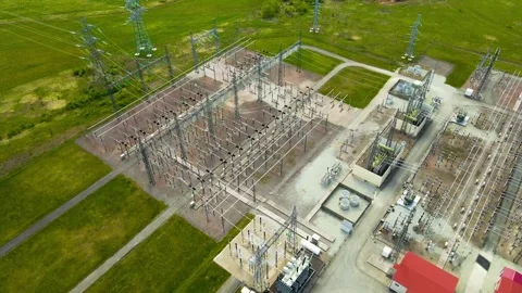 High Voltage Electrical Substation Aerial View of Power Lines and Transformers Stock Footage 336651069