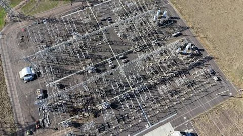 High voltage electrical substation distributing power grid energy Stock Photos