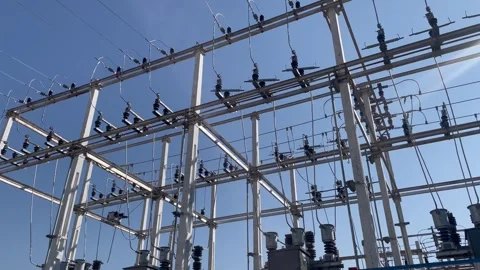 High Voltage Electrical Substation Grid Structure Under Clear Sky Video stock 323257403
