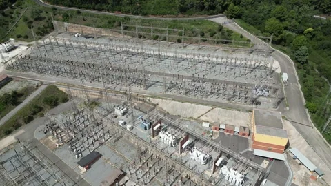 High voltage electrical substation with transformers and transmission lines Stock Footage 317700055