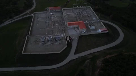 High-voltage electrical substation with transformers and power lines Stock Footage 327273910
