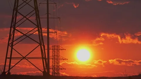 High-voltage electrical support on the background of a gorgeous sunset close up Stock Footage 105534799