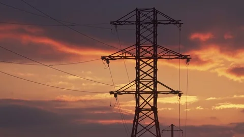 High-voltage electrical support on the background of a gorgeous sunset Stock Footage 105534805
