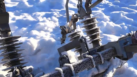 High Voltage Electrical Suspension Insulators Covered in Snow Stock Footage 332202215