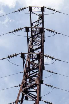 High voltage electrical tower. Power lines and power pylons on a sunny day wi Stock-Fotos