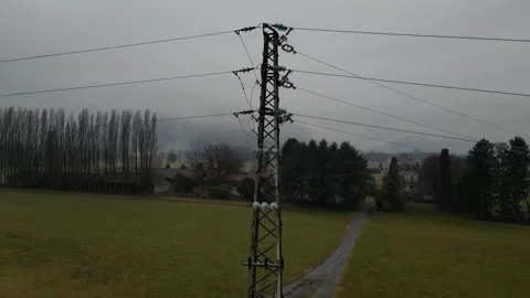 High voltage electrical tower in a rural place cloudy day 스톡 동영상 297607334