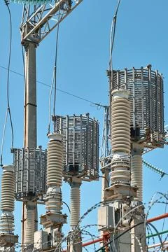 High voltage electrical transformers in an electricity distribution power p.. Stock Photos