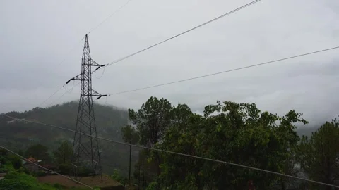 High-voltage electrical wires distributing electricity in the upper Himalay.. Vídeo Stock 281093447