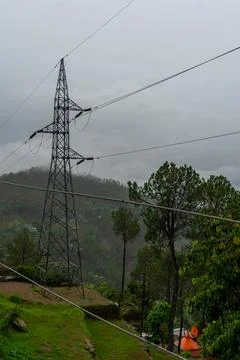 High-voltage electrical wires distributing electricity in the upper Himalay.. Stock Photos