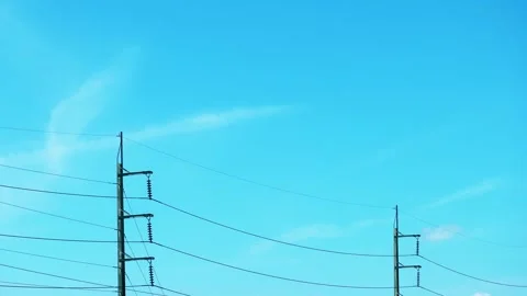 High voltage Electricity power line on Cyan beautiful clear sky TimeLapse Stock Footage 330451076