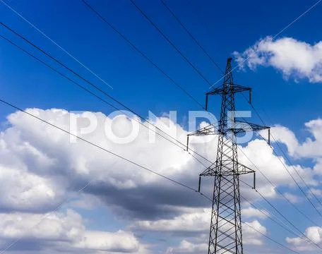 High Voltage Electricity Pylon System On The Sky Background