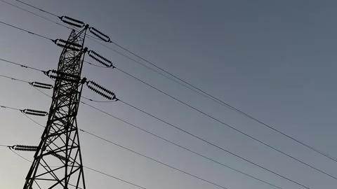 High Voltage Electricity Pylon Tower Against Clear Sky Power Transmission Vidéo 344566764