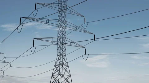 High voltage electricity tower and power lines under the beautiful sky. loop Stock Footage 75337051