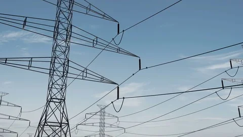 High voltage electricity tower and power lines under the beautiful sky. loop 库存影片 75337319