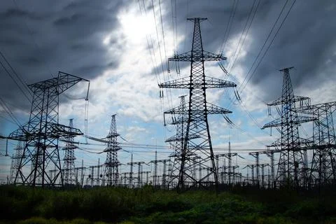 High voltage line on background dramatic clouds and sky. Stock Photos