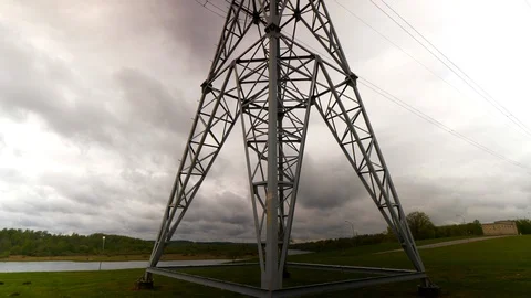 High voltage line pole in a dark day Stock Footage 107519423