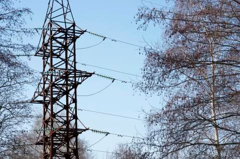 High-voltage line through the forest. The concept of deforestation and power Stock Photos
