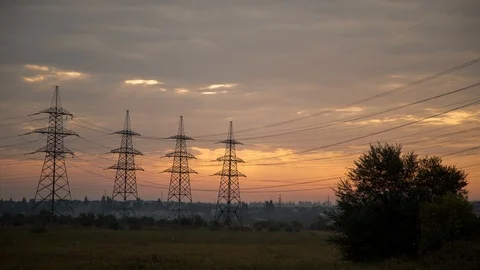 High voltage line. Timelapse. Electric poles against the evening sky Stock Footage 99054956