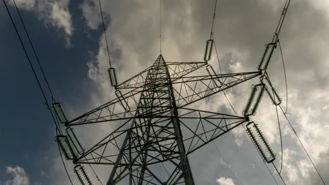 High-voltage line tower blue sky and clouds Stock Footage 154571475
