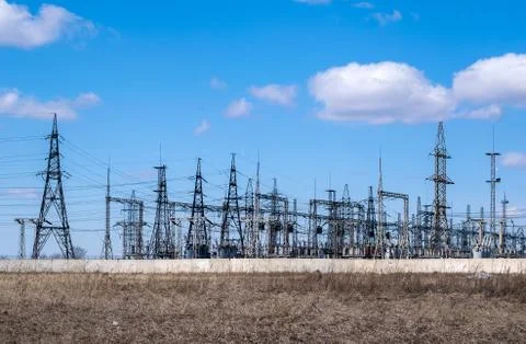 High voltage lines and spring grass Stock Photos
