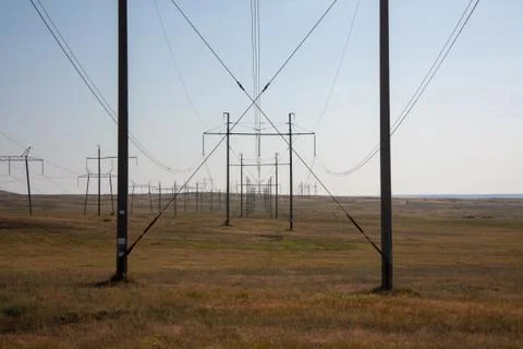 High voltage lines in the field Stock Photos