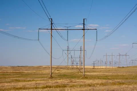 High voltage lines in the field Stock Photos