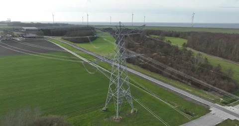 High voltage mast, electricity infrastructure, in The Netherlands. Aerial views Stock Footage 304024418