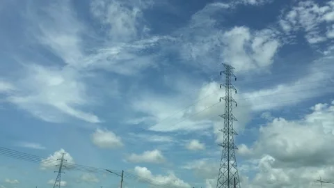 High voltage pole with blue sky cloud time lapse Video stock 139927351