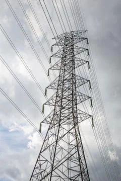 High voltage pole with clouds. Stock Photos