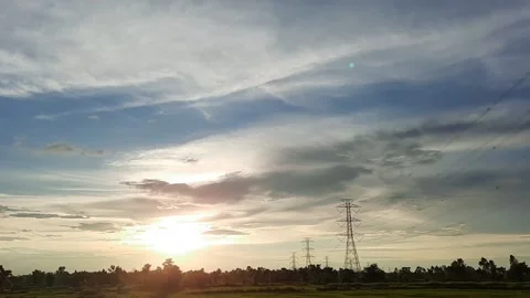 High voltage pole countryside timelapse sunset Stock Footage 157017429
