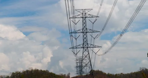 High voltage pole electric wiring distribution landscape energy engineering. Ele Stock Footage 254996019
