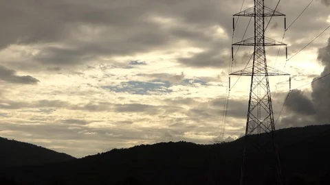 High Voltage Pole mountain in the evening. 4k 動画素材 93069930