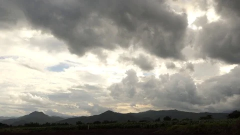 High Voltage Pole moving clouds mountain in the evening. 4k Accelerate time Stock Footage 93069671