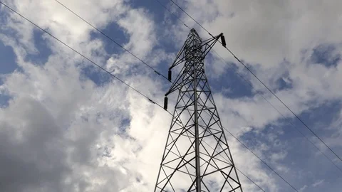 High Voltage Pole moving clouds and blue sky. 4k Accelerate time Stock Footage 93070645