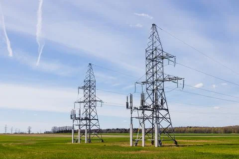 High voltage pole or High voltage electricity tower and transmission power lines Stock Photos