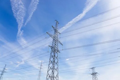 High voltage pole or High voltage electricity tower and transmission power lines Stock Photos
