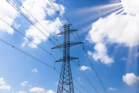 High voltage pole or High voltage electricity tower and transmission power lines Stock Photos